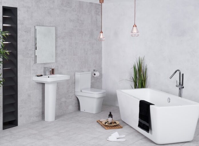 Modern bathroom with a toilet and bathtub
